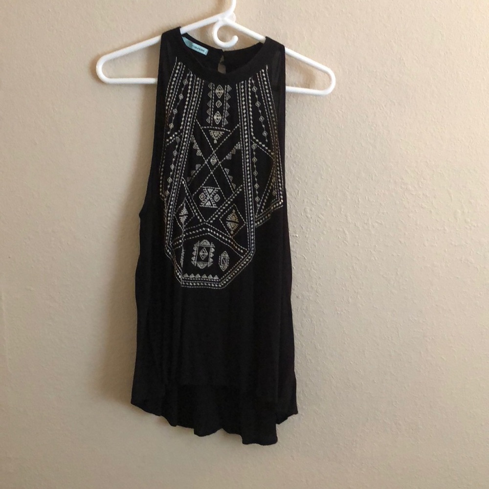 Maurice’s tank top